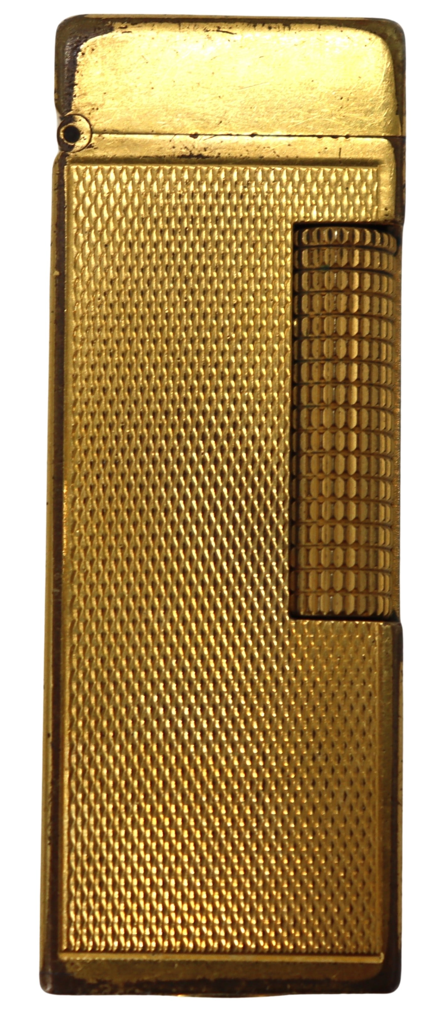 Dunhill Gold Tone Cigarette Lighter: Dunhill Gold Tone Cigarette Lighter. Cigarette lighter in gold tone with stippled texture on body. Marked Made in Switzerland. Dunhill is a British luxury brand, founded in 1893 by Alfred Dunhill