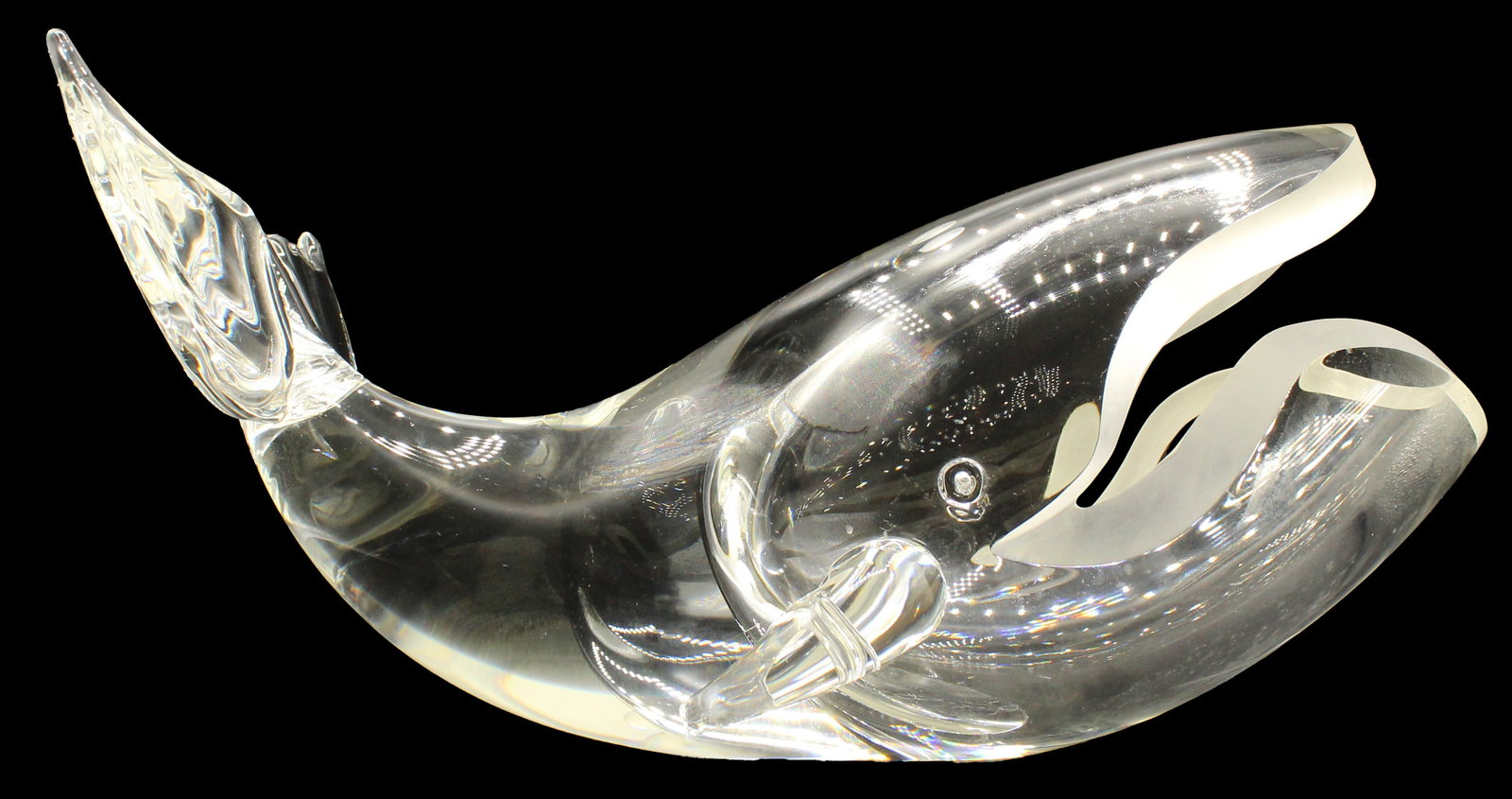 Large Steuben Signed Open Mouthed Glass Whale: Large Steuben Signed Open Mouthed Glass Whale. Minor Wear to bottom commensurate with age. As Is. Lower Lip of Whale. Not visible from the side or above. Size: 7 x 8 x 14 1/2 in. 