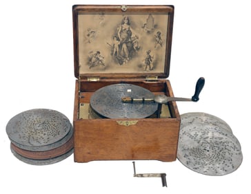 19th Century Regina Music Box Co. In Oak Case with Ten Disc