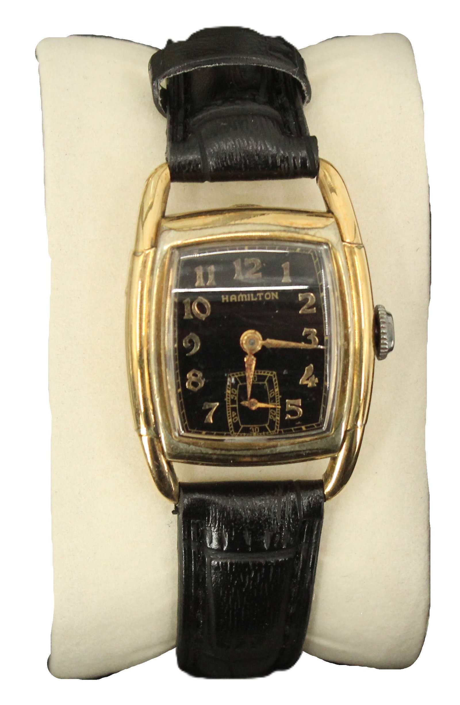 Hamilton 10K Gold Filled Wristwatch with Leather Band, AS IS: Hamilton 10K Gold Filled Wristwatch with Leather Band, AS IS. Black rounded rectangular face with numbers, the 6 replaced by a rounded rectangular second hand timer. We cannot guarantee the work