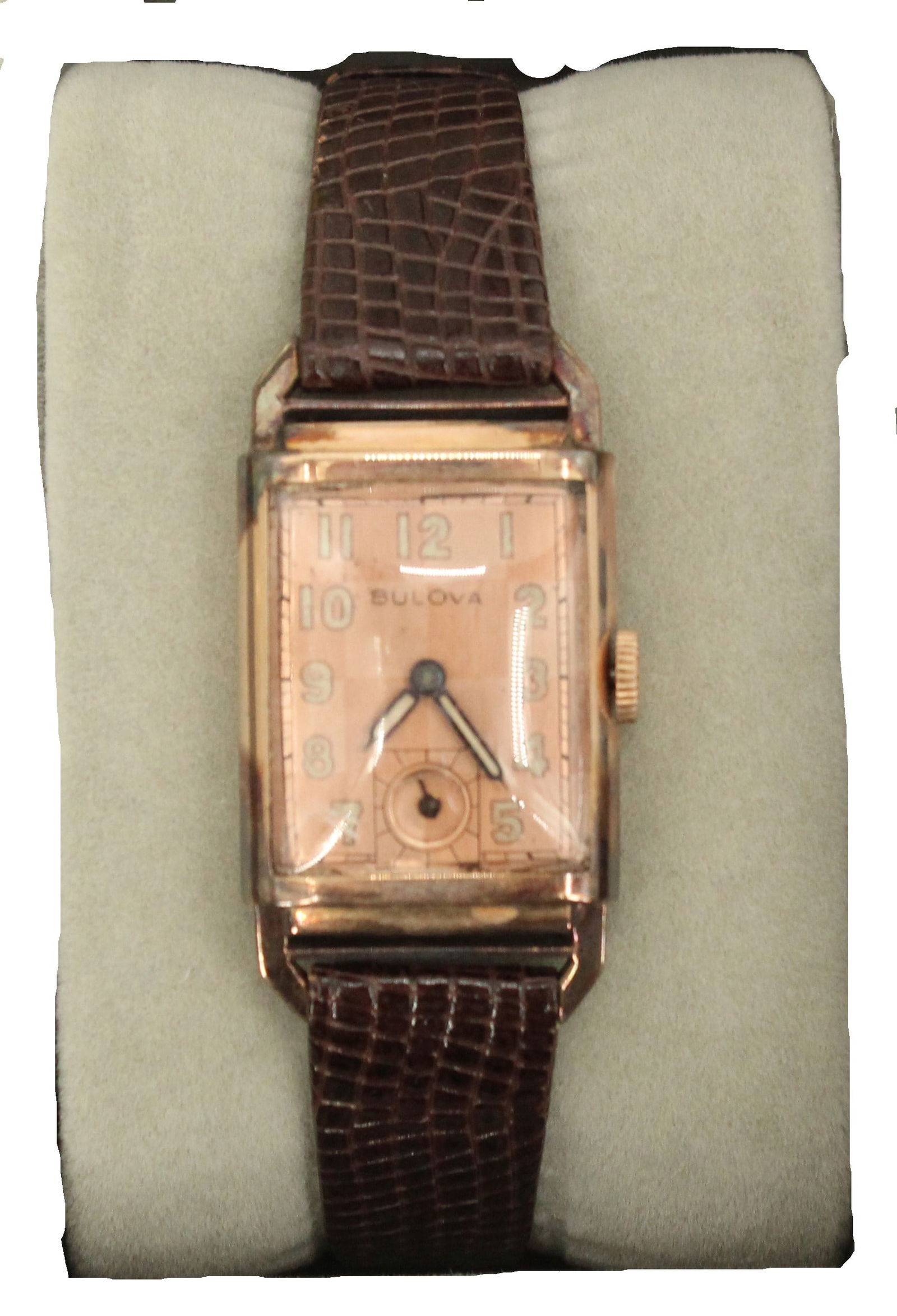 Bulova 14K Gold Filled Wristwatch with Leather Band, AS IS: Bulova 14K Gold Filled Wristwatch with Leather Band, AS IS. Rectangular face with numbers, the number 6 replaced with a circular second hand timer. We cannot guarantee the working condition