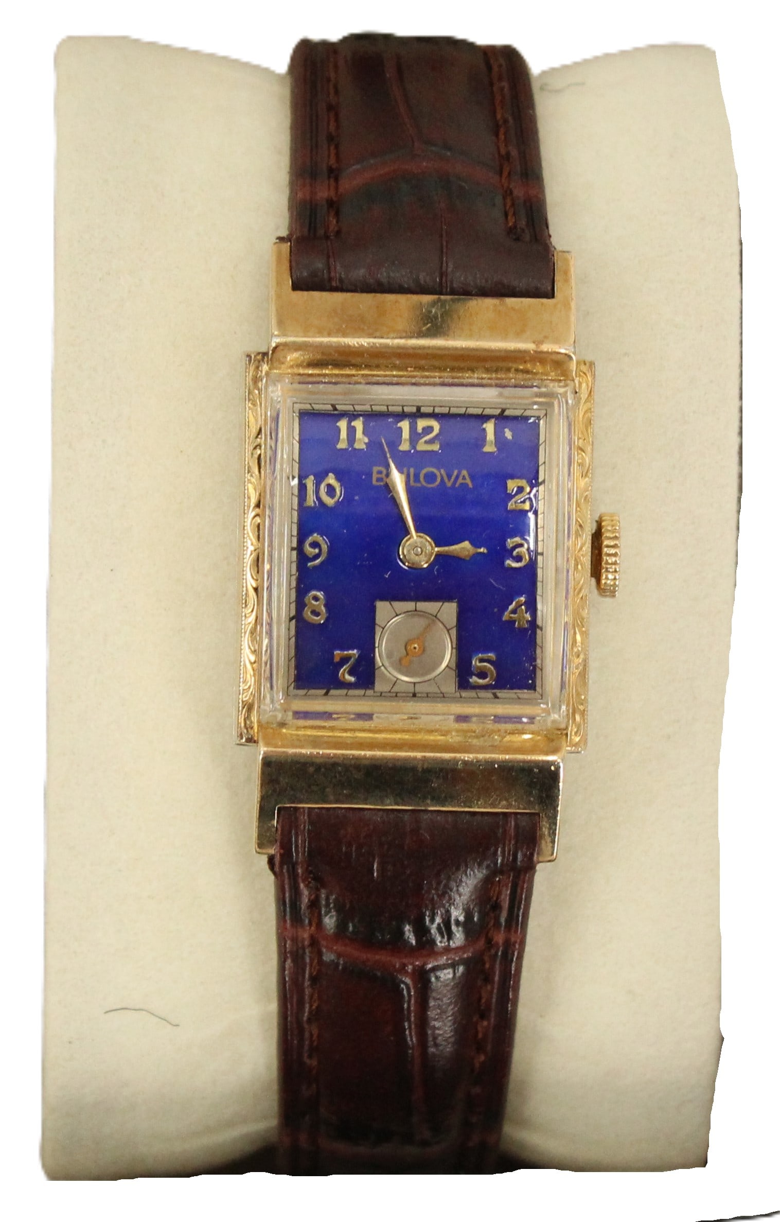 1950s Bulova Gold Tone and Leather Band Wristwatch, AS IS: 1950s Bulova Gold Tone and Leather Band Wristwatch, AS IS. Blue square face, number 6 replaced by a circular second hand timer. We cannot guarantee the working condition of any timepiece. Size: