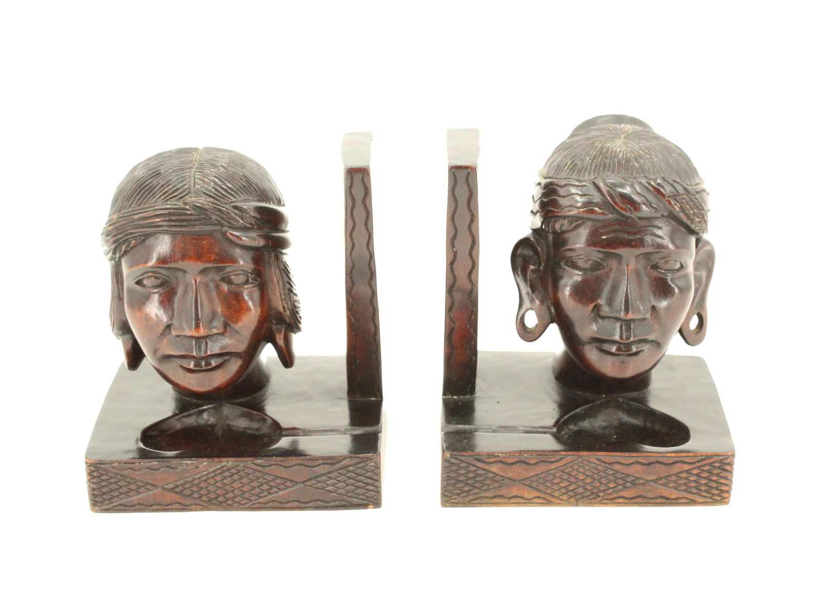 South Pacific Carved Wooden Busts With Heart & Tribal Designs: South Pacific Carved Wooden Busts With Heart & Tribal Designs. Based upon the style of the face, ears, and modern heart design shows it is a modern trending style of the island nations. Size