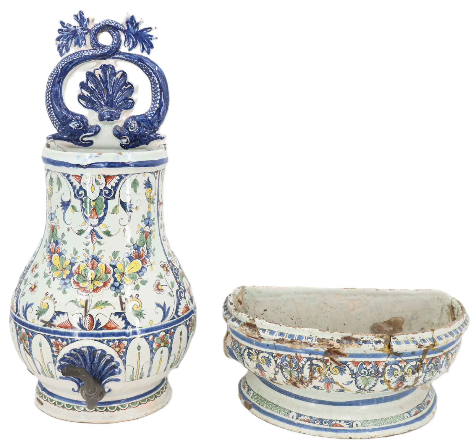 (2) Repaired Italian White and Blue Porcelain Vessels - AS IS: (2) Repaired Italian White and Blue Porcelain Vessels - AS IS. Pair of Italian blue and white vessels, one tall wall vase, one shaving bowl. Condition: Significant damage and loss. Staples 