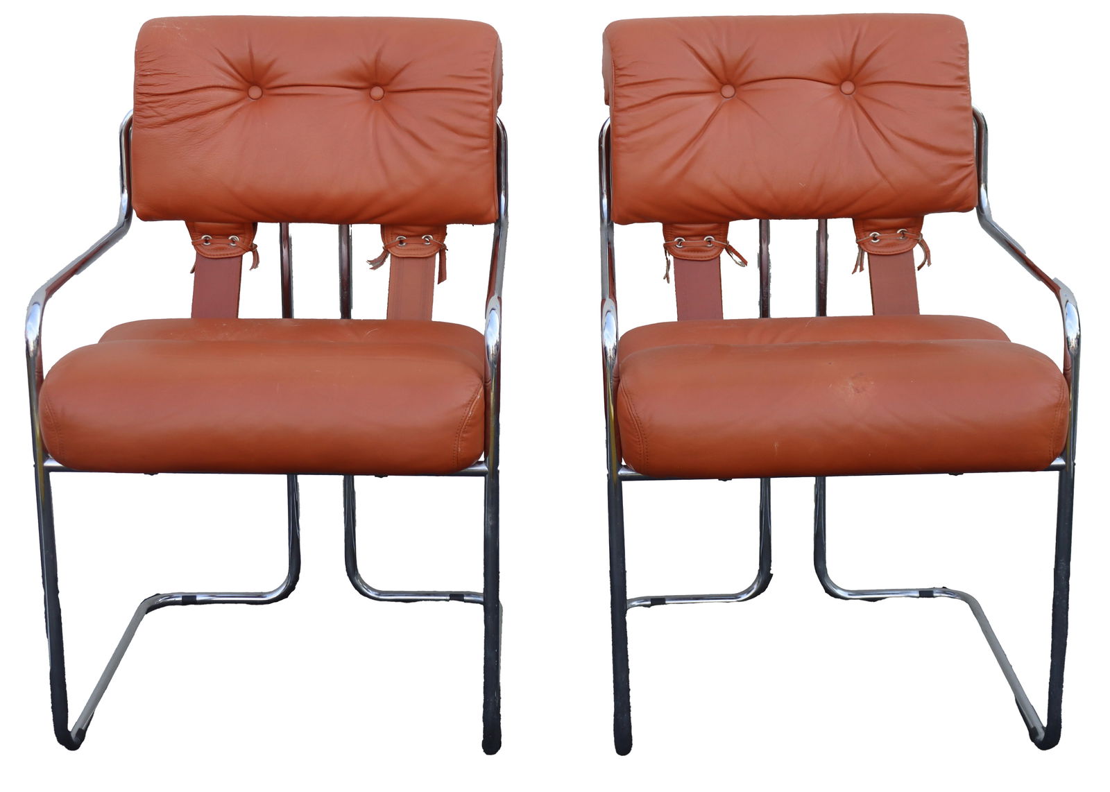 Pair of Guido Faleschini Mariani Chairs: Pair of Guido Faleschini Mariani Chairs. Continuous, bent chrome tubular frame that forms the arms, legs, and back support. Padded cushions for the seat and backrest. Each tufted with 2 buttons in the