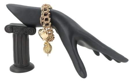 14k Gold Charm Bracelet with 10k, 14k Charms, and one 18k Cartier Charm - Gross 68 g.