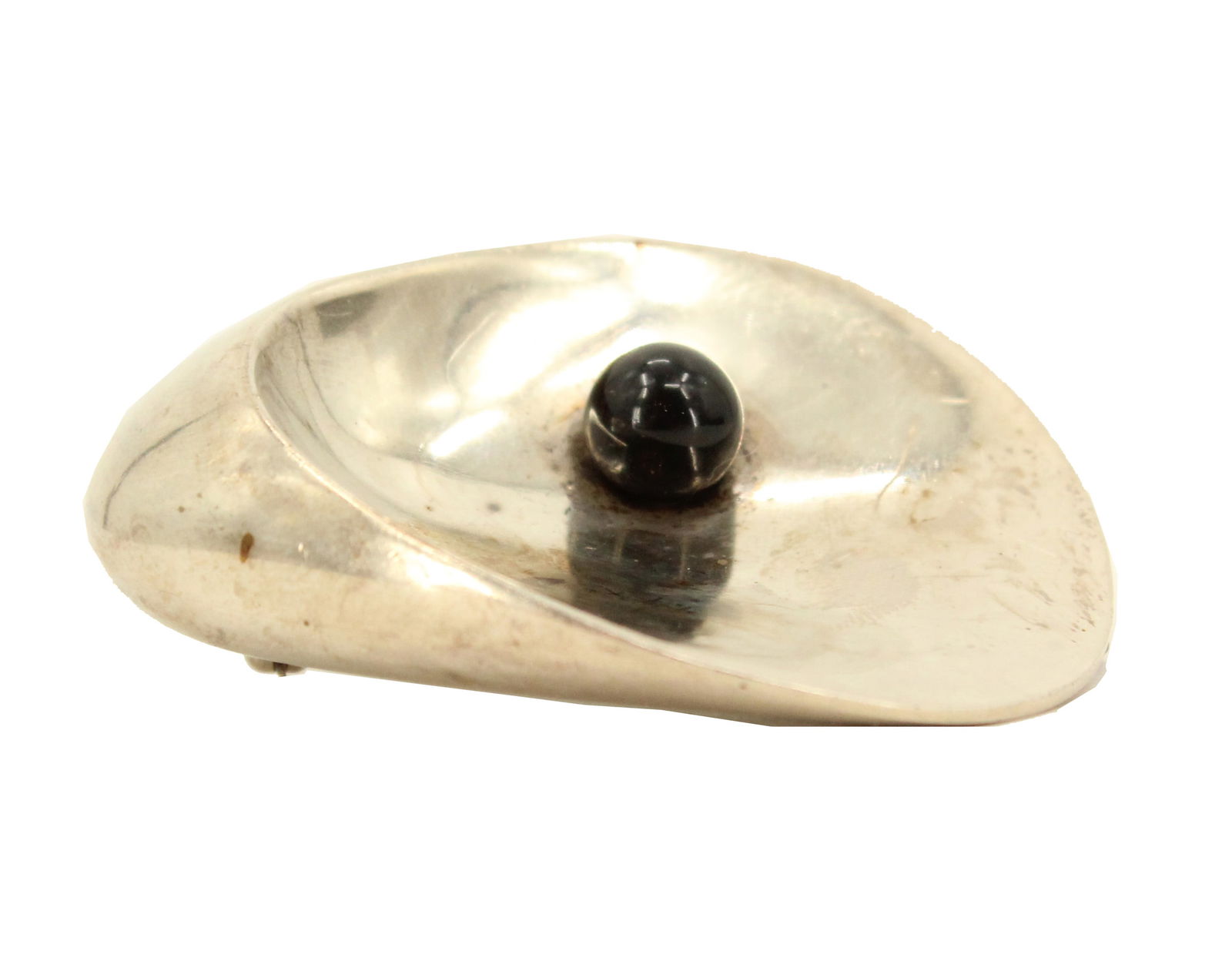 Georg Jensen Sterling Silver and Hematite Brooch by Nanna Ditzel - Gross 0.795 ozt: Georg Jensen Sterling Silver and Hematite Brooch by Nanna Ditzel - 0.795 ozt. Shaped like an oyster with the hematite ball as the pearl, a form created in the late 1950s by Nanna Ditzel, the firs