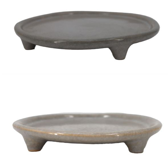 (2) Roseville Pottery 1953 Raymor Stoneware Ovenproof Three-Footed Trays: (2) Roseville Pottery 1953 Raymor Stoneware Ovenproof Three-Footed Trays. Marked on undersides. Raymor was the "last gasp" of the company, produced in 1953 by Ben Siebel with extremely auste