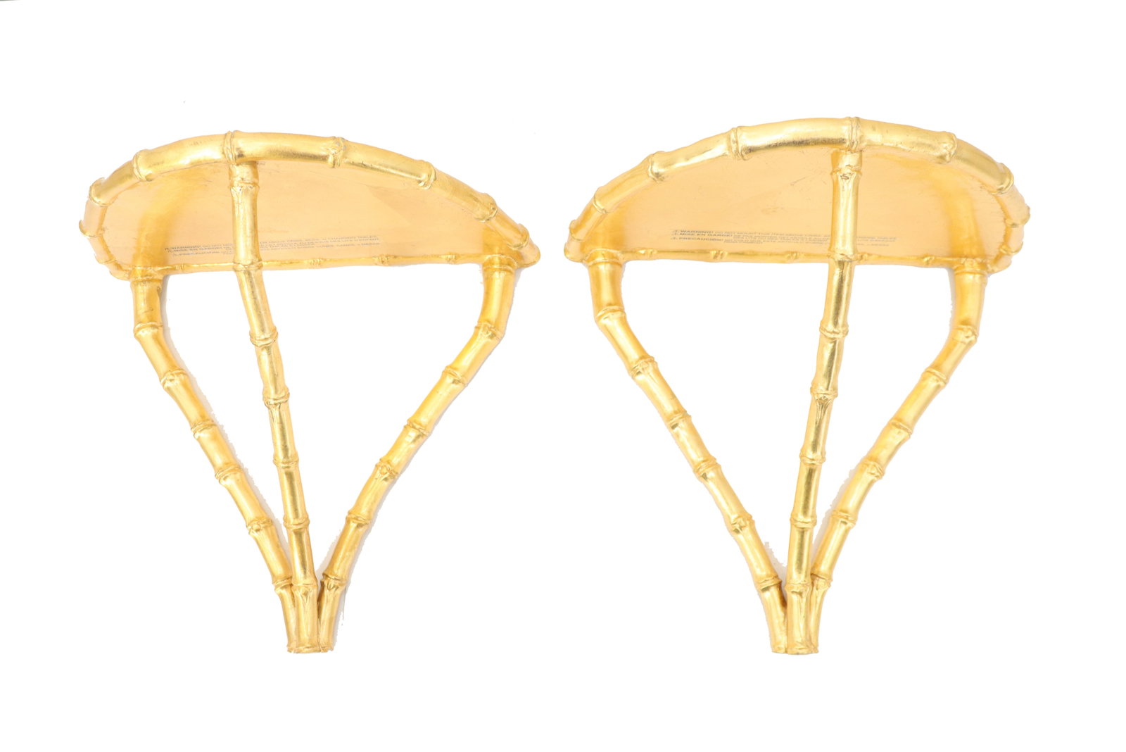 Pair of Gilt Faux Bamboo Contemporary Shelves: Pair of Gilt Faux Bamboo Contemporary Shelves. Three faux bamboo stalks holding a semi-circle flat top. Size: 11 1/2 x 12 1/2 x 12 1/2 in.