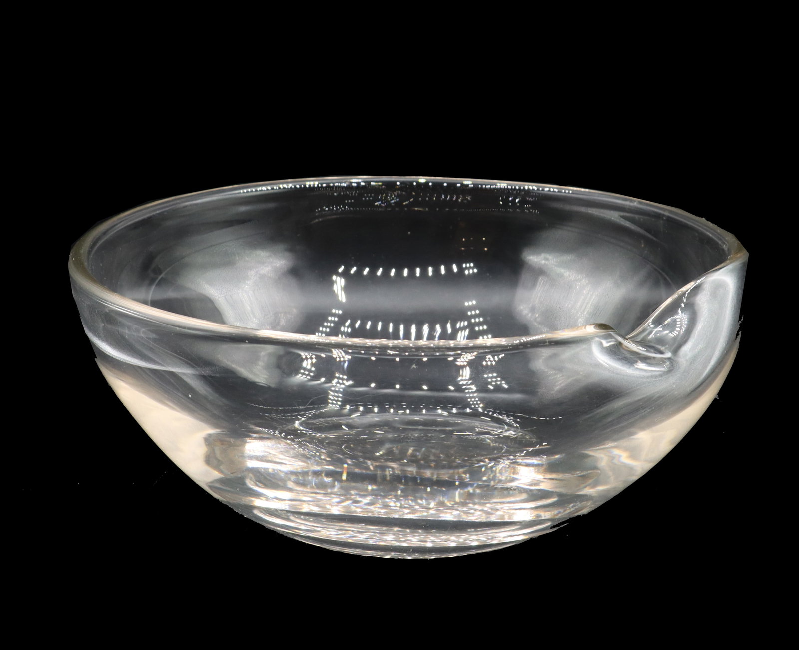 Elsa Peretti (1940-2021) European/American, Tiffany & Co. Crystal Thumbprint Bowl: Elsa Peretti (1940-2021) European/American, Tiffany & Co. Crystal Thumbprint Bowl. One of her most famous creations for the company, with a small pinched spot along the rim for easier carrying. Si