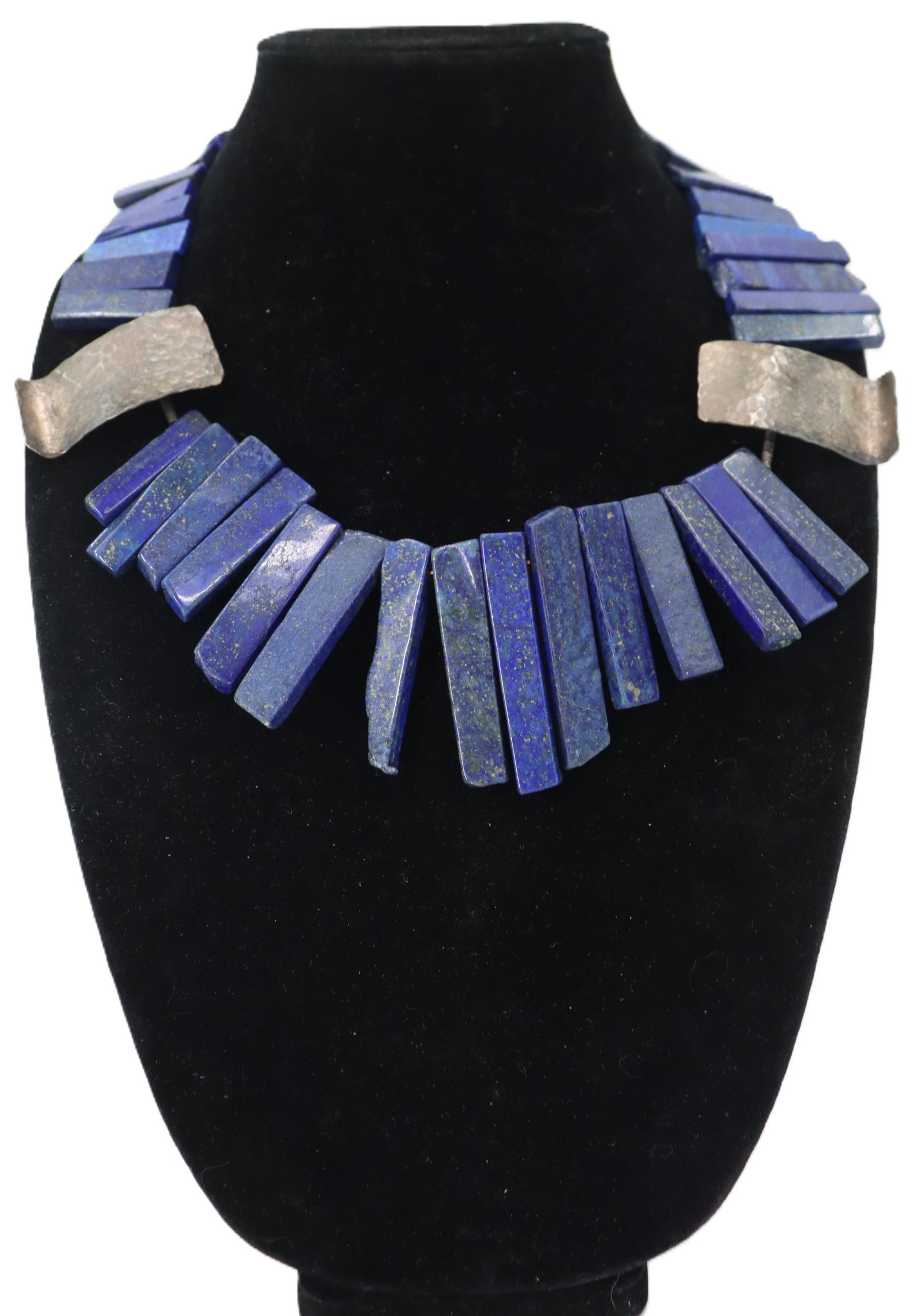 Tested 90% Silver and Lapis Necklace: Tested 90% Silver and Lapis Necklace. Several elongated rectangles of lapis strung on one strand. Two silver rectangles, one on each side, hammered design. Length: 16 in. 