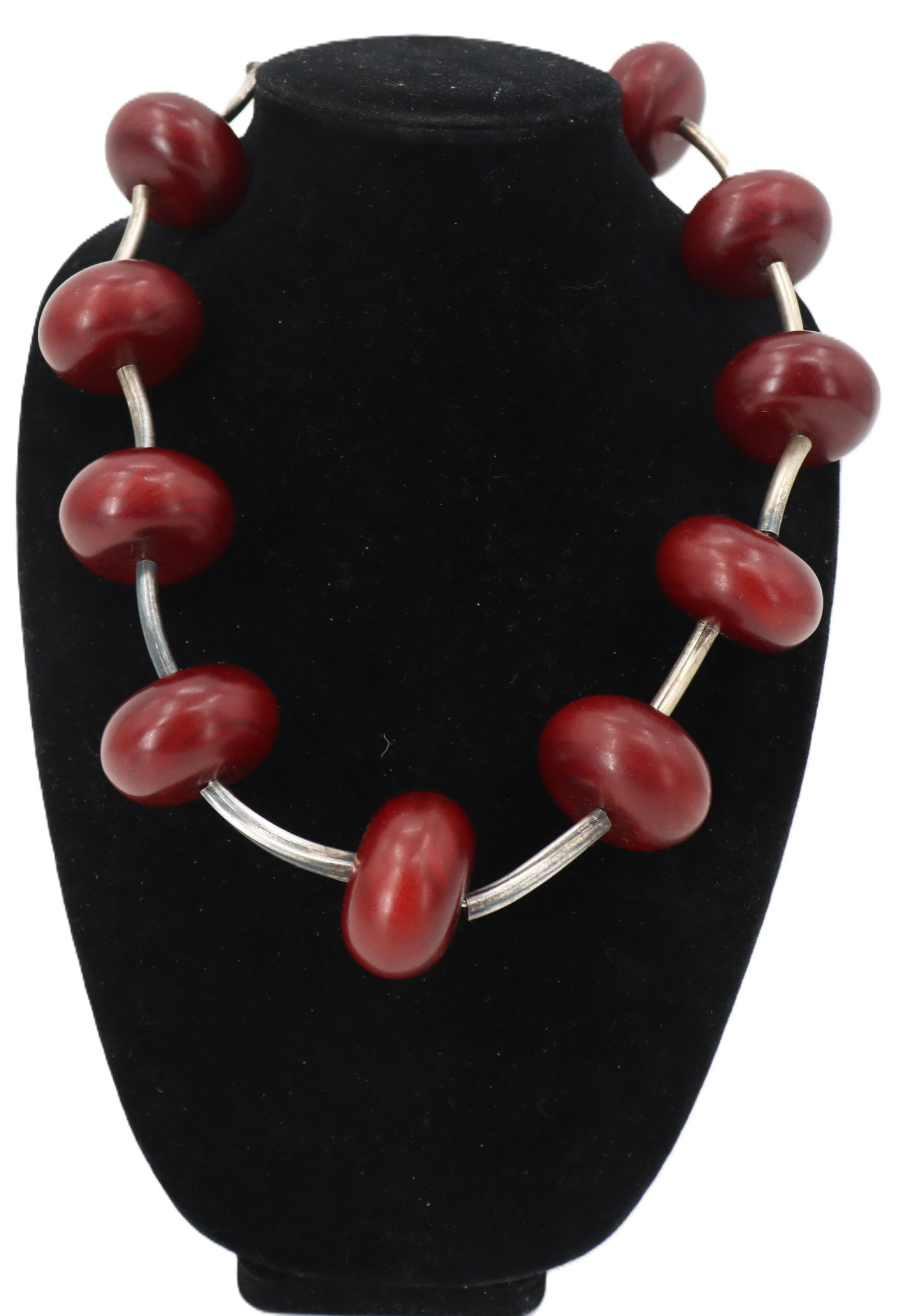 Hardstone and Silver Necklace: Hardstone and Silver Necklace. Large, rounded, red beads. Long, silver, cylindrical beads in-between. Length: 22 in. 