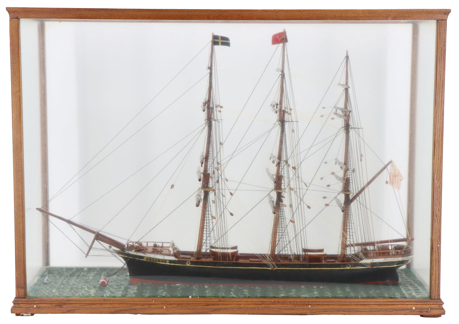 Ship Model Diorama of the Three Masted Sailing Ship "Robert": Ship Model Diorama of the Three Masted Sailing Ship "Robert". Mounted at its waterline in choppy seas. Mounted in a glass case. Size: 10 1/4 x 20 x 28 1/4 in.