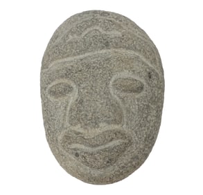 Carved Circular Stone in the form of a face