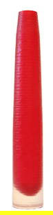 Scandinavian Mid Century Modern Narrow Art Glass Vase: Scandinavian Mid Century Modern Narrow Art Glass Vase. Mainly cherry red body with horizontally-lined gouges creating a textured surface, and a clear flat base with a tapered top and a thin lip. Unsig