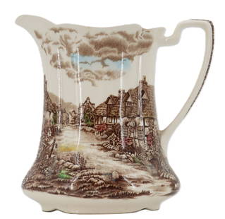 Vintage British Johnson Bros. Olde English Countryside Ceramic Pitcher: Vintage British Johnson Bros. Olde English Countryside Ceramic Pitcher. Johnson Bros. ceramic pitcher with wrapped image of a landscape engraving depicting a rural English town under a cloudy sky. Sta