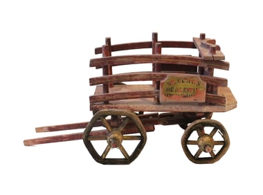 Early 20th Century St. Claus Dealer in Good things Wagon