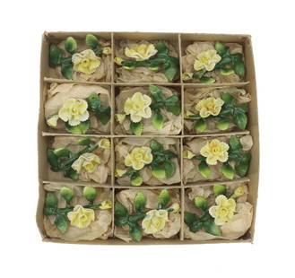 (12) German Painted Ceramic Carnations: (12) German Painted Ceramic Carnations. Lot comprised of twelve German porcelain yellow carnations. German porcelain, particularly celebrated through the Meissen manufactory established in the e