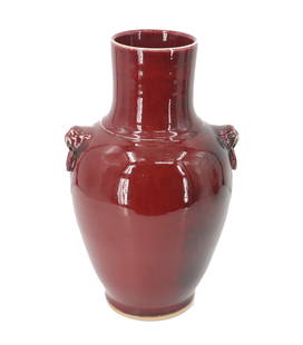 Chinese Marked Yongzheng Honorific Sang de Boeuf Glazed Terracotta Vase: Chinese Marked Yongzheng Honorific Sang de Boeuf Glazed Terracotta Vase. Classic design with two small figureheads with rings in their mouths near the base of the neck. Incised kanji on base appe