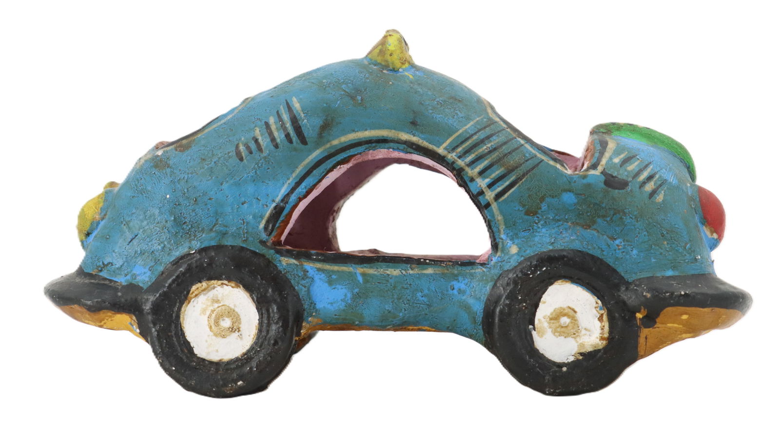 Mexican Folk Art Ceramic Blue Car: Mexican Folk Art Ceramic Blue Car. The main body is chunky and irregular, with a distinctive curved shape that arches over an open, unglazed (possibly reddish-brown) interior, suggesting an abst