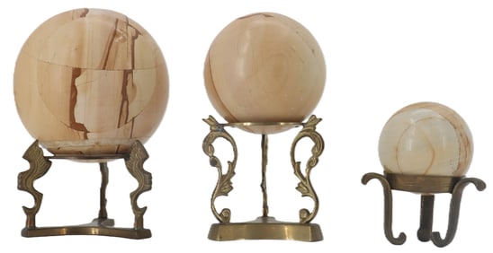 (3) Stone Balls on Brass Stands of Varying Sizes