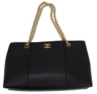 Chanel Leather Shoulder Bag: Chanel Leather Shoulder Bag. Rectangular in shape with a flat bottom. Gold toned hardware. Prominent gold-toned Chanell CC logo. Size:Â 8 1/4 x 17 x 3 1/2 in. Chanel is a French