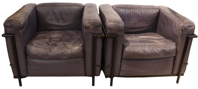 Pair of LeCorbusier Style Mauve Leather Arm Chairs: Pair of Vintage LeCorbusier Style Mauve Leather Arm Chairs. Mauve leather with black metal frames. Iconic modernist design with cuboid shape and exposed metal frames. They are comfortable.&nbsp;Condit