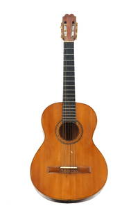 Vintage Spanish Folk Guitar: Vintage Spanish Folk Guitar. Condition: Broken string. Size: 39 x 14 1/2 x 3 1/2 in. &nbsp; Folk guitars are acoustic guitars designed and played primarily within traditional and popular folk music st