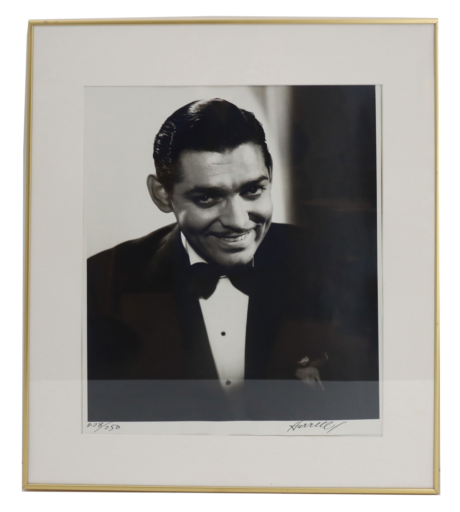 George Hurrell (1904-1992) American, Signed Photographic Print of Clark Gable: George Hurrell (1904-1992) American, Signed Photographic Print of Clark Gable. Clark Gable (1901-1960) was an American actor who won one Academy Award and is best known for his role in the epic 1939 f