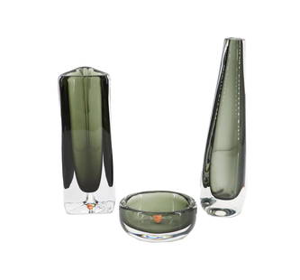 (3) Nils Landberg for Orrefors Dusk Green Glass - (2) Vases and Ash Tray: (3) Nils Landberg for Orrefors Dusk Green Glass - (2) Vases and Ash Tray. Lot comprised of three dusk green Orrefors glass items by Nils Landberg; one prism vase, one fluted vase, one ash tray. incise