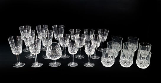 (24) Pieces of Waterford Cut Crystal Drinkware of Various Shapes and Sizes