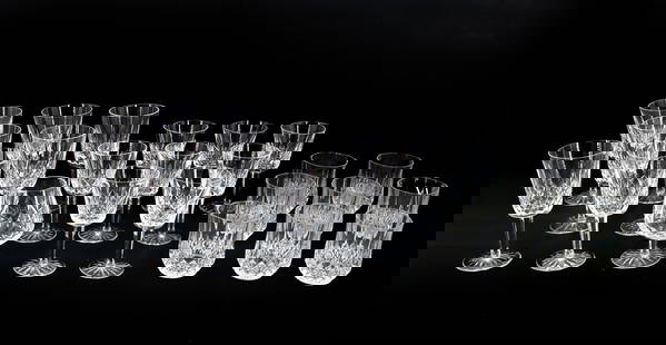 (24) Pieces of Waterford Cut Crystal Drinkware of Various Shapes and Sizes: (24) Pieces of Waterford Cut Crystal Drinkware of Various Shapes and Sizes. Includes water glasses, wine glasses, whiskey glasses, and a brandy snifter. Marked on the bases.&nbsp; Condition: All great