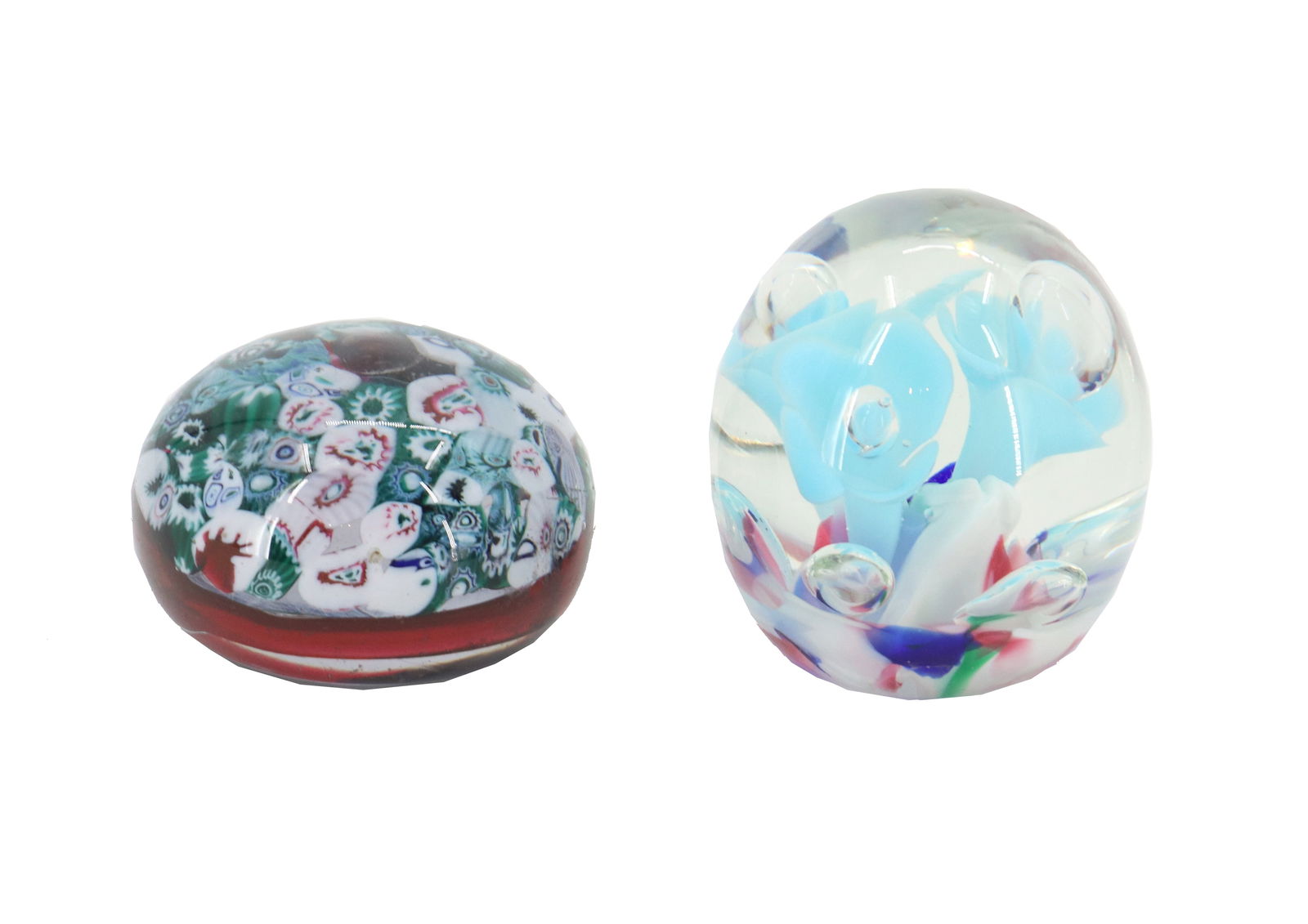 Italian Millefiori and Glass Trumpet Paperweights: Italian Millefiori and Glass Trumpet Paperweights. One piece is in the classic style, and the other is taller with more elongated glass rolls within. Neither bear markings, but both resemble pieces fr