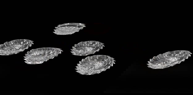 (6) Crystal and Cut Glass Shallow Bowls: (6) Crystal and Cut Glass Shallow Bowls. Four are round and have a swirling pattern on their base, while two are more oval and had a starburst pattern on their bottom. None marked. Display stand not i