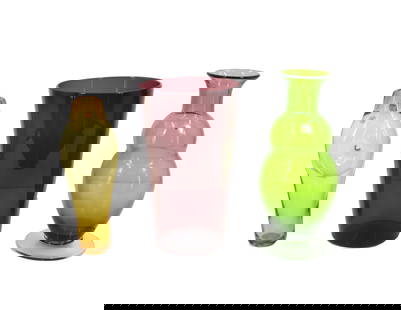 (3) Handmade Blenko Glass Vases: (3) Handmade&nbsp;Blenko Glass Vases. The green and yellow ones have the original tag still attached, while the purple one does not.&nbsp; Condition: Excellent.&nbsp; Size: (largest) 7 1/4 x 7 1/2 x 1