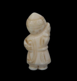 Tiny Carved Bone Smiling and Waving Figurine