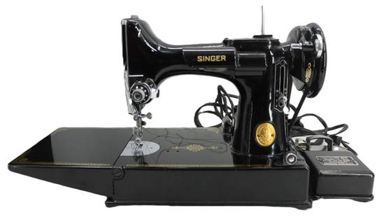 Vintage Receptacle Singer 221 3-Pin Sewing Machine: Vintage Receptacle Singer 221 3-Pin Sewing Machine. Vintage 221 3-Pin electric sewing machine by Singer. Singer sewing machines are iconic tools that revolutionized home and industrial sewing, known f