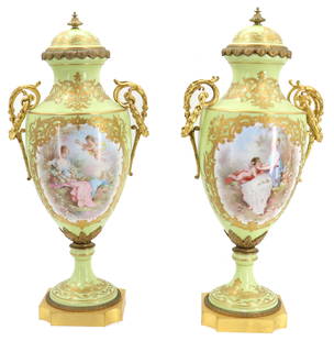 Monumental Late 19th Century Early 20th Century Pale Green French Sevres Style Porcelain and Gilt: Monumental Late 19th Century Early 20th Century Pale Green Sevres Style Porcelain and Gilt Bronze Covered Urns. Scarce color. Hand decorated with landscape scenes on either side. Each scene has a woma