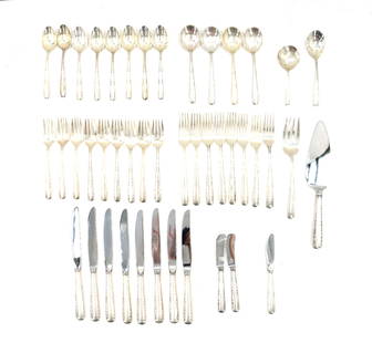 (44) Gorham Camellia Sterling Silver Flatware - 35.255 ozt.: (44) Carmellia Sterling Silver Flatware - 35.255 ozt. Includes: 9 Salad forks8 dinner forks8 Teaspoon4 Soup spoons8 dinner knives3 butter knives 1 Sugar spoon1 Cake server1 serving fork1
