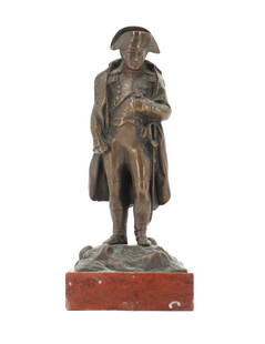Small Bronze Statue of Napoleon Bonaparte: Small Bronze Statue of Napoleon Bonaparte. A small bronze sculpture of Napoleon, attached to wooden base.&nbsp; Size: 1 3/4 x 2 x 4 7/8 in. &nbsp; The bronze statue of Napoleon captures the commanding
