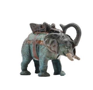 Cast Iron Elephant Coin Bank: Cast Iron Elephant Coin Bank. Cast iron elephant coin bank with pull tail that operates trunk. Cast iron elephant banks are charming and collectible items that combine decorative appeal with nostalgic