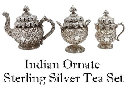 (3) Indian Ornate Sterling Silver Tea Set: (3) Indian Ornate Silver Metal Tea Set. A beautiful and unique ornately decorated tea serving set of tea pot, creamer, and sugar bowl, with exterior decorated in highly detailed foliate metalwork with