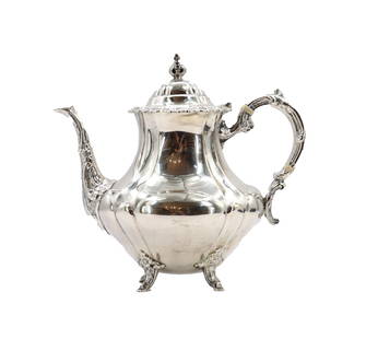Reed and Barton Sterling Silver Tea Pot - 25.450 ozt.: Reed &amp; Barton was founded in 1824 in Taunton, Massachusetts, and became one of the most respected American sterling silver manufacturers. While it started with silver-plated and Britannia metal pr