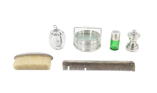 (12) Sterling Silver Accented Vanity Items: (12) Serling Silver Accented Vanity Items. Lot comprised of twelve vanity items with sterling silver accents; brush, comb, perfume bottles, and glass trays and holder. Vanity items are personal access