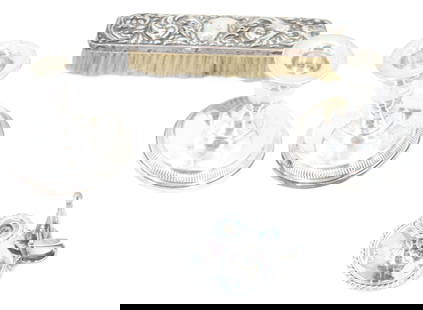(4) English Sterling Silver Items - Gross 22.710 ozt.: (4) English Sterling Silver Items - Gross 22.710 ozt. Lot comprised of four sterling silver items, three candle holders and one brush. Largest Size: 3 1/2 x 3 1/2 x 3 1/2 in. Gross Wei