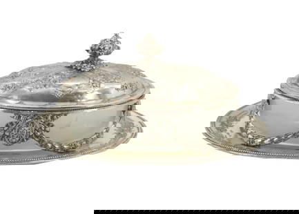 Silverplated Butter Dish and Tray: Silverplated Butter Dish and Tray. Silverplate butter dish with foliate festooning on sides, floral decor on lid and flower bud finial, with glass and silverplate tray. Size: 8 1/4 x 6 1/2 x 4 in. &nb