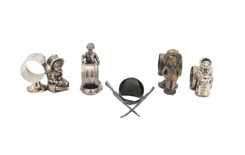 Group of 5 Silver Figural / Decorative Napkin Rings: Group of 5 Silver Figural / Decorative Napkin Rings. Size: 3 1/4 x 2 x 2 3/4 in.