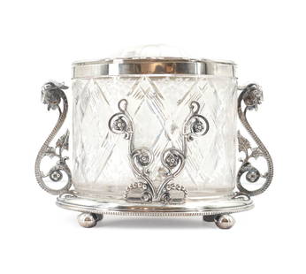 Antique Glass and Silver Plate Biscuit Jar: Antique Glass and Silver Plate Biscuit Jar. Glass biscuit jar with silver plated rim and hinged lid, fitted for silver plated holding tray with foliate and vine handles. Decorative biscuit jars, also