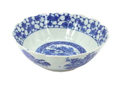 Chinese Blue and White Bowl: Chinese Blue and White Bowl. Chinese blue and white porcelain bowl with pheasant and floral design. Unmarked. Size: 9 3/4 x 9 3/4 x 3 3/8 in. Chinese blue and white porcelain is one o