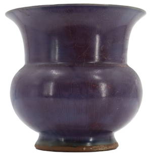 19th Century Chinese Purple Glazed Pot or Jardiniere: 19th Century Chinese Purple Glazed Pot or Jardiniere. Ceramic pot with rich purple exterior glaze, celadon green interior, with wide mouth and bulbous body on elevated circular foot. Five drainin